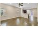Spacious living room with sleek concrete floors and open access to the kitchen at 2792 Whispering Trails Dr, Winter Haven, FL 33884