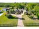 Beautiful exterior home features well-manicured lawn, a brick driveway and mature landscaping at 2836 S Stewart St, Kissimmee, FL 34746