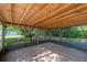 Enclosed outdoor patio with brick flooring and a view of the backyard at 2836 S Stewart St, Kissimmee, FL 34746