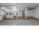 Clean laundry room with modern washer and dryer, ample storage, and a utility sink at 3029 Peel Ave, Orlando, FL 32806
