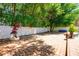 Spacious brick-paved patio area overlooking the backyard, surrounded by a white fence at 310 Stakes Ct, Deland, FL 32724