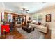 Inviting living room with built-in shelving, fireplace, and comfortable seating at 310 Stakes Ct, Deland, FL 32724