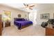 Spacious bedroom with plush carpet, neutral walls, and ample natural light at 310 Stakes Ct, Deland, FL 32724