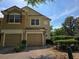 Inviting two-story townhome with attached garages and well-maintained landscaping at 3542 Shallot Dr # 108, Orlando, FL 32835