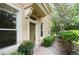 Charming front entrance featuring a classic door, well-maintained landscaping, and a welcoming pathway at 3542 Shallot Dr # 108, Orlando, FL 32835