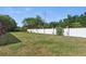 Well maintained back yard area featuring a bright blue sky at 392 Bayberry Dr, Polk City, FL 33868