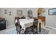 Dining room with table set for four and a view into the kitchen at 392 Bayberry Dr, Polk City, FL 33868