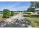 Long sidewalk leading to a community dock and lake access at 392 Bayberry Dr, Polk City, FL 33868