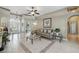 Spacious living room with high ceilings, tile floors, and an open layout at 392 Bayberry Dr, Polk City, FL 33868