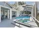 Covered pool area featuring a pool, a spa, a patio area, and views of the backyard at 392 Bayberry Dr, Polk City, FL 33868