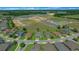 Aerial view showcases new home construction in a well-designed community with expansive green spaces at 4687 Nw 35Th Lane Rd, Ocala, FL 34482