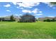 Expansive backyard with a screened lanai, perfect for outdoor living and entertaining at 4687 Nw 35Th Lane Rd, Ocala, FL 34482