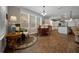 Open floor plan features dining nook with wood floors and views to the kitchen at 4687 Nw 35Th Lane Rd, Ocala, FL 34482