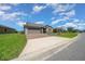 Lovely single-Gathering home with a brick-paved driveway and a spacious two-car garage at 4687 Nw 35Th Lane Rd, Ocala, FL 34482