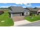Beautiful single Gathering home with a well-manicured lawn and paver driveway at 4687 Nw 35Th Lane Rd, Ocala, FL 34482