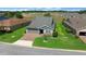 Charming single-Gathering home with lush lawn, manicured landscaping, and a two-car garage at 4687 Nw 35Th Lane Rd, Ocala, FL 34482