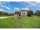 Charming front yard showing landscaping and mature tree at 4687 Nw 35Th Lane Rd, Ocala, FL 34482