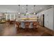 Spacious kitchen with granite counters, island, stainless appliances, breakfast bar, and pendant lighting at 4687 Nw 35Th Lane Rd, Ocala, FL 34482