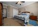 Well-lit main bedroom with a comfortable bed and closet space at 4687 Nw 35Th Lane Rd, Ocala, FL 34482