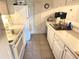 Functional kitchen with ample counter space and white appliances at 510 Cranes Way # 206, Altamonte Springs, FL 32701