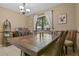 Close-up of a wooden table in the dining room area at 512 Derby Dr, Altamonte Springs, FL 32714