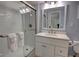 Modern bathroom with a glass-enclosed shower and stylish vanity at 5203 S Atlantic Ave # 416B, New Smyrna Beach, FL 32169