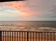 Enjoy ocean views from this balcony with a beautiful beach and colorful sunset at 5203 S Atlantic Ave # 416B, New Smyrna Beach, FL 32169