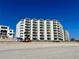 Beautiful beachfront condo building with private balconies and ocean access at 5203 S Atlantic Ave # 416B, New Smyrna Beach, FL 32169