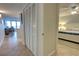 Hallway view to the living room and bedroom shows the open layout at 5203 S Atlantic Ave # 416B, New Smyrna Beach, FL 32169