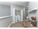 The upstairs laundry room features a washer and dryer and space to store laundry items at 558 Pinebranch Cir, Winter Springs, FL 32708