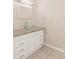 Bathroom boasts a unique glass bowl sink and granite countertop at 611 Sanford Ave, Sanford, FL 32771