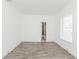Spacious bedroom showcasing tile floors and an open ensuite bathroom at 611 Sanford Ave, Sanford, FL 32771