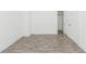 Bedroom with tile floors and open closet at 611 Sanford Ave, Sanford, FL 32771