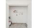 Empty closet with white walls and concrete floor at 611 Sanford Ave, Sanford, FL 32771