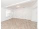 Spacious living room featuring wood floors, neutral tones, and bright natural light at 611 Sanford Ave, Sanford, FL 32771