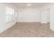 Bright living room boasting hardwood floors, white walls, and natural light at 611 Sanford Ave, Sanford, FL 32771