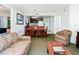 Open living space includes dining, kitchen, and living area with comfortable seating and natural light at 6403 Parc Corniche Dr # 4114, Orlando, FL 32821