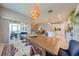 Dining area view, connects to the kitchen, Gathering room, and outdoor patio at 6807 Habitat Dr, St Cloud, FL 34773