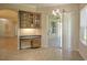 Breakfast nook featuring a sliding glass door out to the patio, and a built-in desk area at 7167 Winding Lake Cir, Oviedo, FL 32765