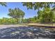 Community playground with play equipment and lake views at 7167 Winding Lake Cir, Oviedo, FL 32765