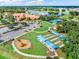 Aerial view showcasing community amenities including a clubhouse and park at 725 High Vista Dr, Davenport, FL 33837