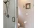 Accessible bathroom with a walk-in shower and convenient grab bar for safety at 725 High Vista Dr, Davenport, FL 33837