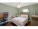 Comfortable bedroom with a cozy bed and a charming decorative theme at 725 High Vista Dr, Davenport, FL 33837