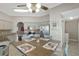 Bright, open kitchen featuring stainless steel appliances and a dining area at 725 High Vista Dr, Davenport, FL 33837