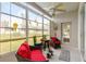 Inviting lanai with ample seating and view of the green backyard at 725 High Vista Dr, Davenport, FL 33837