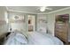 Relaxing main bedroom with soothing colors, ceiling fan, and ensuite bathroom access at 725 High Vista Dr, Davenport, FL 33837