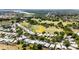 Aerial view of a charming house in a golf community at 7264 Hawksnest Blvd, Orlando, FL 32835