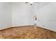 Spacious bedroom features high ceilings, tile flooring, and a ceiling fan at 7264 Hawksnest Blvd, Orlando, FL 32835
