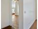 Hallway leading into an open room and features natural light at 7264 Hawksnest Blvd, Orlando, FL 32835