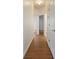 Hallway with new paint, flooring and door and base trim at 7264 Hawksnest Blvd, Orlando, FL 32835